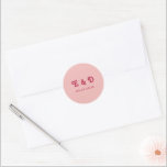 Monogram Chic Retro Hot Pink & Blush Wedding Classic Round Sticker<br><div class="desc">Add a playful yet elegant touch to your wedding details with the Monogram Chic Retro Hot Pink & Blush Wedding Classic Round Sticker. Featuring a stylish monogram in retro typography with a bold hot pink and blush colour palette, this sticker is perfect for sealing envelopes, decorating favours, or enhancing your...</div>