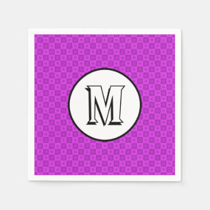 Monogram circles and squares on a purple pattern napkin