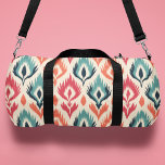 Monogram Colourful Tribal Abstract Pattern Duffle Bag<br><div class="desc">Monogram Colourful Tribal Abstract Pattern Personalised Name Duffle Bag Sports Bag Gym Bag features an elegant colourful ethnic pattern in blue,  green,  orange and pink on a cream background. Add your custom monogram,  name or text for a fabulous gift for family and friends. Created by Evco Studio www.zazzle.com/store/evcostudio</div>