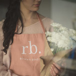 Monogram Coral Peach Elegant Feminine Minimalist Apron<br><div class="desc">A minimalist monogram design with large typography initials in a classic font with your name below on a feminine coral peach background. The perfectly custom gift or accessory!</div>