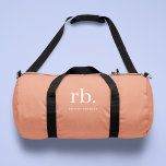 Monogram Coral Peach Elegant Feminine Minimalist Duffle Bag<br><div class="desc">A minimalist monogram design with large typography initials in a classic font with your name below on a feminine coral peach background. The perfectly custom gift or accessory!</div>