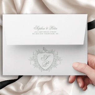 Monogram crest sage green wedding envelope