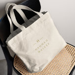 Monogram Gold | Elegant Minimalist Classy Large Tote Bag<br><div class="desc">A simple stylish custom monogram design in a gold modern minimalist typography. The monogram initials and name can easily be personalised along with the feature line to make a design as unique as you are! The perfect bespoke gift or accessory for any occasion.</div>