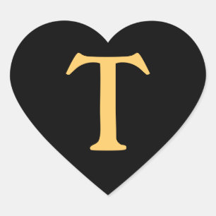 Monogram gold T on black background Heart Sticker