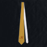 Monogram Gold Tie<br><div class="desc">No one will look better than you when you wear this tie with your initial on it. Add the initial that you want in the field provided. You can add one or more initials or a name, the choice is yours. The type style, size and colour can also be changed....</div>
