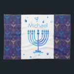 Monogram Hanukkah Festival Menorah Lights Tea Towel<br><div class="desc">Hanukkah Menorah Lights Holiday label. Monogram and Hanukkah Logo Decoration with traditional symbols pattern. Home & Living > Kitchen & Dining > Table & Kitchen Linens > Kitchen Towels. Israel,  Jerusalem. Sofiartmedia Modern Design.
Judaica Modern Design with text template. Personalise them by adding name or wishes text.</div>