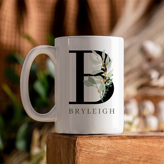 Monogram Initial Watercolor Greenery Coffee Mug (This mug features a monogram with watercolor greenery with gold and the name below in green.)