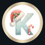 Monogram letter K, Santa hat Christmas  Sticker<br><div class="desc">This design features a watercolor illustration of letter K with Santa hat,  holly and candy cane.</div>