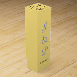 Monogram Mellow Yellow Wedding Wine Box<br><div class="desc">Pretty mellow yellow solid background wedding wine favour boxes for your reception guests. Use for wine or champagne bottles tucked inside, or for anniversary or other special occasions. Personalise with the Bride and Groom's Monogrammed Initials and Wedding Date in blue and black text. Top of box has the wording Thank...</div>