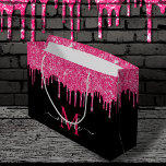 Monogram Metallic Hot Pink Dripping Glitter Black Large Gift Bag<br><div class="desc">**Monogram Metallic Hot Pink Dripping Glitter Black Large Gift Bag** This monogram black and metallic bright neon hot pink dripping faux sparkling glitter custom large paper gift and shopping bag template allows you to quickly add any name to the front and back with ease, using Zazzle's quick and easy personalisation...</div>