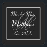 Monogram Minimal Black and White Wedding Favour Square Sticker<br><div class="desc">Embrace modern sophistication with our chic wedding thank-you favour stickers. The minimalist allure of these stickers is accentuated by an elegant black and white text design, offering a touch of contemporary class to your celebration. Personalise them further by incorporating your initials or monogram, transforming these stickers into a bespoke expression...</div>