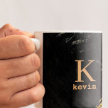 Monogram name black gold elegant coffee mug<br><div class="desc">Modern man monogrammed elegant coffee mug with gold and black abstract brush strokes.            Personalise it with name and initial letter. It can be a classy gift for a groomsman,  best man,  boyfriend,  husband,  dad,  uncle on a wedding,  birthday,  Christmas,  or any other anniversary or occasion.</div>