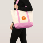 Monogram orange and pink tote bag<br><div class="desc">Add your own details on this monogram orange print on pink background design.</div>