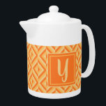 Monogram Orange Three-Tone Diamond Pattern<br><div class="desc">Make your tea in this Monogram Orange Three-Tone Diamond Pattern Teapot. It features a geometric diamond pattern in three shades of orange with an initial in light orange against a dark orange square. Personalise it with your initial. Give your teatime an extra pop of colour.</div>