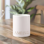 Monogram Personalised Pink Initial And Name  Coffee Mug<br><div class="desc">Enjoy your favourite beverages in style with our Minimalistic Monogram Personalised Pastel Pink Mug. Featuring a soft pastel pink background, this elegant mug is adorned with a sleek monogram initial and your custom name in a modern font. Perfect for coffee, tea, or hot chocolate, this mug combines functionality with a...</div>