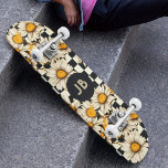 Monogram Retro Groovy Daisy Chequerboard Skateboard<br><div class="desc">Monogram Retro Groovy Daisy Chequerboard Skateboard features a groovy daisy pattern on a black and white chequerboard pattern background with your custom text or personalised initials in the centre. Perfect as a gift for family and friends for Christmas,  birthday,  holidays,  work colleagues and more. Created by ©Evco Studio www.zazzle.com/store/evcostudio</div>