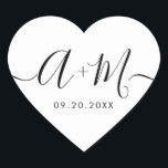 Monogram Script Custom Wedding date Heart Heart Sticker<br><div class="desc">Elevate your wedding details with the Minimalist Monogram Script Custom Wedding Date Heart shaped Sticker (see other shapes). This elegant and personalized sticker adds a touch of sophistication to your wedding stationery, allowing you to showcase your monogram and wedding date in a simple yet impactful way. The sticker features a...</div>