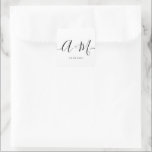 Monogram Script Wedding date Minimalist Custom Square Sticker<br><div class="desc">Elevate your wedding details with the Minimalist Monogram Script Custom Wedding Date Sticker. This elegant and personalised sticker adds a touch of sophistication to your wedding stationery, allowing you to showcase your monogram and wedding date in a simple yet impactful way. The sticker features a minimalist script design that exudes...</div>