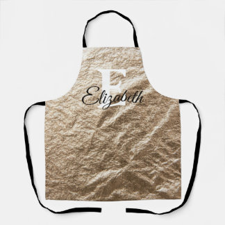 Monogram Text on gold crumpled paper background Apron