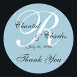 Monogram Wedding Thank You Label Sticker<br><div class="desc">Blue Elegant Wedding Monogram Thank You Labels. These wedding thank you stickers are the perfect way personalise your wedding favours. Custom template for initial "R". Add your bride and groom names and wedding date. Gorgeous script font overlay design on a white background. Elke Clarke©</div>