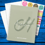 Monogram Weekly Monthly Planner<br><div class="desc">This spiral-bound planner features a green monogram initial and your first name in white on a sage green background. Choose SOFT or HARD COVER and the colour of your spiral spine. Includes monthly and weekly planning space,  60 pages and 12 months. Fun for yourself or create as a gift.</div>