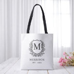 Monogram White Black Crest Botanical Wedding  Tote Bag<br><div class="desc">Make a timeless statement with our Monogram White Black Crest Botanical Wedding Tote Bag. Featuring a clean white background, a sophisticated black botanical crest, and your personalised monogram, this tote offers a perfect blend of classic style and modern design. Ideal for welcome bags, bridal party gifts, or guest favours, it’s...</div>