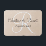 Monogrammed bathmat<br><div class="desc">A perfect reminder of a special day,  monogrammed bathmat.  Wedding or anniversary. Available in different sizes.  The background colour may be changed also to fit your decor.</div>
