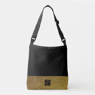 Monogrammed black and gold crossbody bag