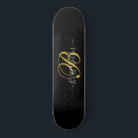 Monogrammed Gold Black Skateboard<br><div class="desc">A stylish gold monogram on black skateboard in a script typography name and initial.</div>