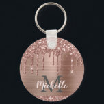 Monogrammed Rose Gold Glitter Drips on Pink Metal Key Ring<br><div class="desc">Modern, girly rose gold glitter drips name and monogrammed keychain.This design features blush pink rose gold glitter sparkle drips on pink brushed metal background with custom personalised monogram initial and first name text template. Perfect feminine gift. Please note, this design is printed photo effect. If you need help or matching...</div>