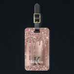 Monogrammed Rose Gold Glitter Drips on Pink Metal Luggage Tag<br><div class="desc">Modern, girly rose gold glitter drips name and monogrammed luggage tag. This design features blush pink rose gold glitter sparkle drips on pink brushed metal background with custom personalised monogram initial and first name text template. Perfect feminine gift. Please note, this design is printed photo effect. If you need help...</div>