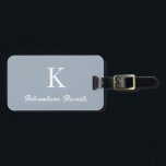Monograms Dusty Blue Adventure Awaits Gift Favour Luggage Tag<br><div class="desc">Monogrammed initial s with custom text "Adventure Awaits" and also personal details like name,  address,  phone number and email all of which you can edit. Designed with popular dusty blue background,  you can change the colour if you wish.</div>