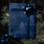 Moody Tree Pattern | Classy Navy Blue Christmas Wrapping Paper<br><div class="desc">Tis the season for rich creative, artsy custom colour! Modern, dark, and moody patterned holiday design with a fun festive jewel tone palette features a whimsical sparkly Christmas trees with a frisky paint splatter enhanced with faux metallic glitter along with a matching low profile solid background. For other colours or...</div>