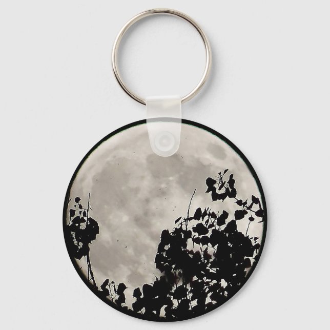 Moon behind dark leaves key ring (Front)