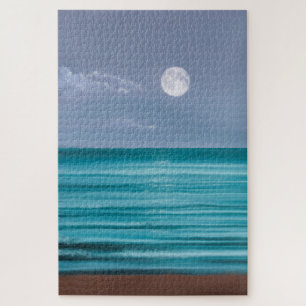 Moon rise over teal sea jigsaw puzzle