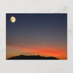 Moonrise over sunset postcard