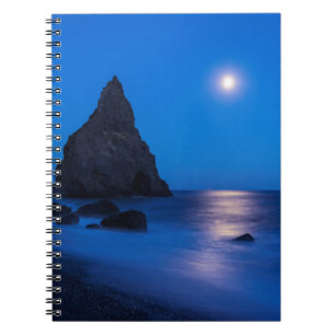 Moonrise reflection on ocean and sea stacks spiral notebook