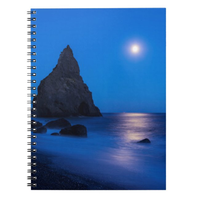 Moonrise reflection on ocean and sea stacks spiral notebook (Front)