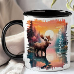 Moose at Sunset Lake Reflection  Mug<br><div class="desc">Add a touch of wilderness to your morning routine with the Moose at Sunset Lake Reflection Mug. This stunning mug features a majestic moose standing in a serene lake at sunset, with the vibrant colours of the setting sun and the tranquil forest beautifully reflected in the water. Customised with your...</div>