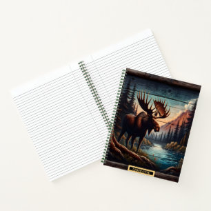Moose by a peaceful mountain stream notebook
