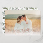 More The Merrier Announce Pregnancy Photo<br><div class="desc">Announce your pregnancy in style with these beautiful,  full photo holiday cards! They feature modern,  elegant typography reading,  "The More,  The Merrier" in real foil. The back contains a Christmas pattern of pine boughs over a custom colour background (shown in white - black also looks amazing).</div>
