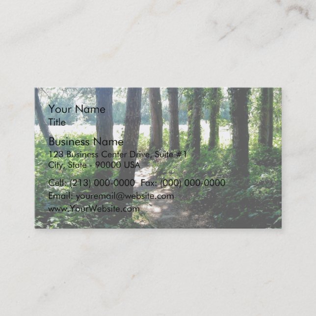 Morning light illuminates a woodland path business card (Front)