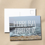 Morro Bay California Ocean Waves Photography Postcard<br><div class="desc">A gorgeous overcast day in Morro Bay California brings cool ocean waves to the shore in this coastal photograph. This pretty seaside photo features white script over the beach rocks and grey sky.</div>