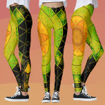 Mosaic Mandala Flower Green Orange and Black Leggings<br><div class="desc">This mosaic kaleidoscope flower features brilliant green,  orange,  and black tiles. It's vivid geometry is inspired by fractals,  mandalas,  and stained glass mosaics. Get this trippy design now for your favourite friend who loves bright colours!</div>