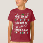 Most Likely To Fart On Santa s Lap Family Christma T-Shirt<br><div class="desc">Most Likely To Fart On Santa's Lap - is a funny and unique design for your kid or the entire Family. Made especially for Christmas Holiday. For any custom design please feel free to contact us and we will do our best to create it just for you. Designed by BASHKATOONA...</div>