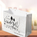 Most Wonderful Time of The Year Black Christmas Large Gift Bag<br><div class="desc">Most Wonderful Time of The Year Black Christmas Large Gift Bag . This elegant gift bag has a white background with the Christmas quote "ITS THE MOST WONDERFUL TIME OF THE YEAR " written in pretty typography style font along with the family name. Customise it by changing the name ....</div>