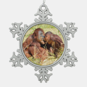 Mother and juvenile orangoutans (Pongo pygmaeus)  Snowflake Pewter Christmas Ornament