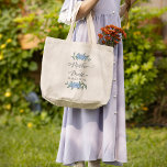 Mother of the Bride Blue Floral Personalised Large Tote Bag<br><div class="desc">Celebrate the mother of the bride with this elegant and stylish gift featuring soft watercolor floral details and delicate blue flowers. Designed with graceful calligraphy script and a clean, minimalist layout, this thoughtful keepsake is perfect for honouring her role in the wedding party. A trendy and heartfelt gift for her...</div>