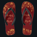 Mother of the Bride Dark Burgundy & Gold Foliage Jandals<br><div class="desc">These gorgeous Mother of the Bride Dark Burgundy and gold foliage flip flops have a dark burgundy background that is adorned with an intricate gold floral greenery pattern and customisable modern typography. The combination of the rich burgundy and the shimmering gold create an elegant and luxurious aesthetic. It's a beautiful...</div>