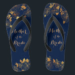 Mother of the Bride Gold Foliage Navy Blue Jandals<br><div class="desc">These gorgeous Mother of the Bride gold foliage navy blue flip flops have a dark blue background that is adorned with an intricate gold floral greenery pattern and customisable modern typography. The combination of the rich navy and the shimmering gold create an elegant and luxurious aesthetic. It's a beautiful gift...</div>